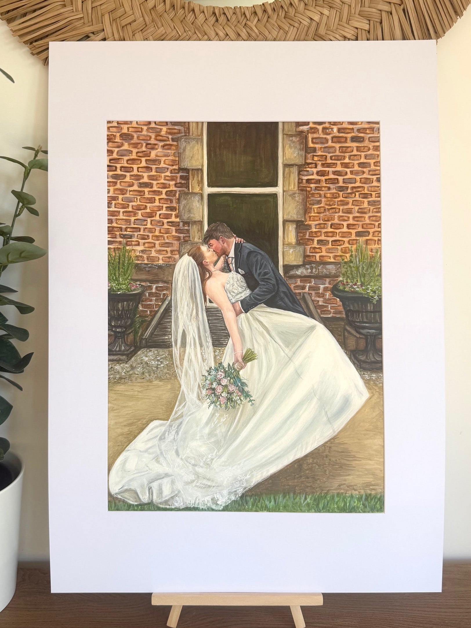 Colour wedding portrait of bride and groom outside a brick wedding venue